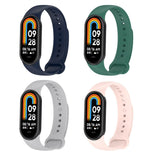 KOMI 4 Pack Watch Band Compatible with Xiaomi Mi Band 8 / Mi Band 9Soft Silicone Replacement band Sport Adjustable Wrist Strap for Women Men