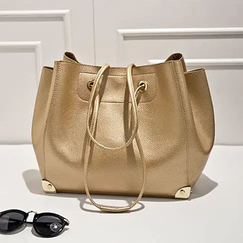 Class Appeal Handbags In Gold, Platinum And Classic Black - Glide Goods LLC